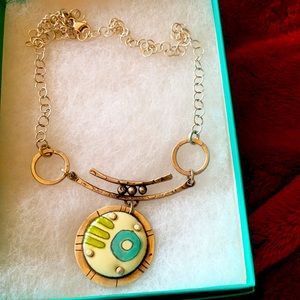 Sterling silver necklace with art enamel design.